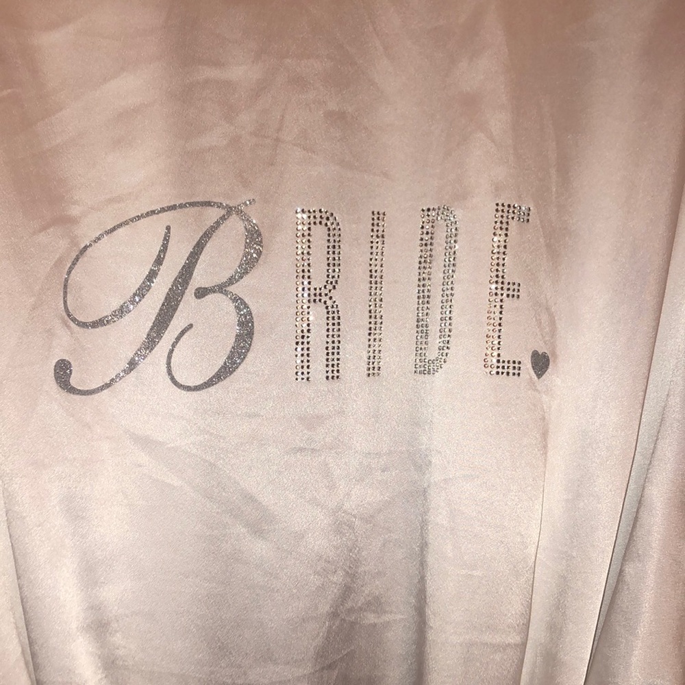 Victoria’s Secret Bride robe. One size and 100% polyester. Excellent condition.